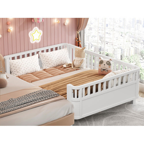 White children's bed with wooden accents in a bright room.