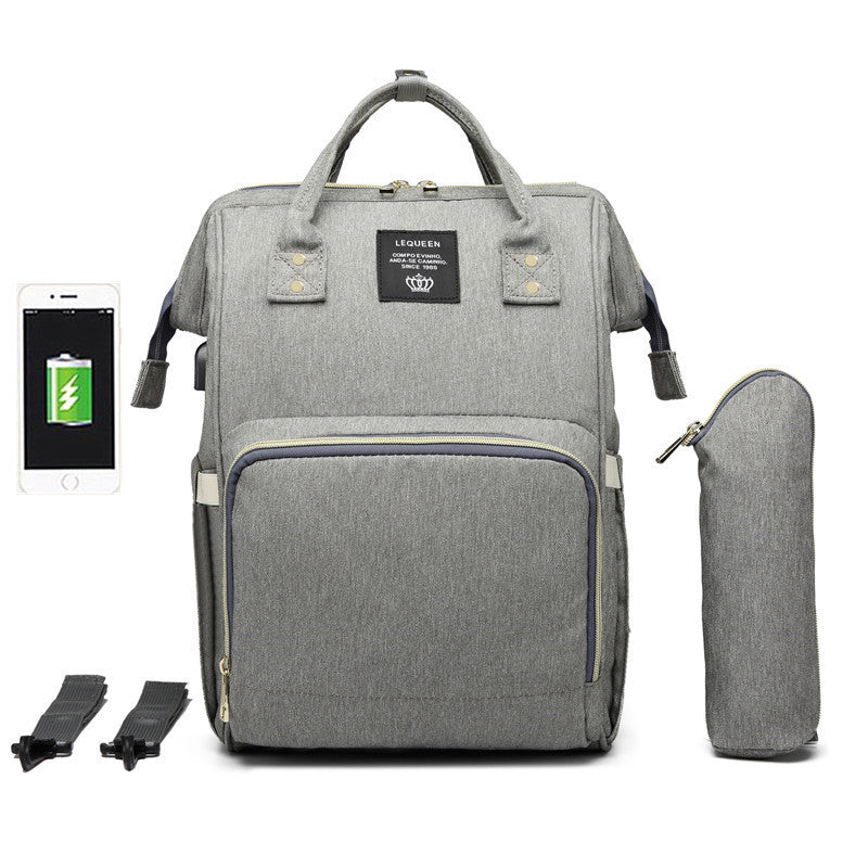 Gray backpack with additional pouch and phone on a white background