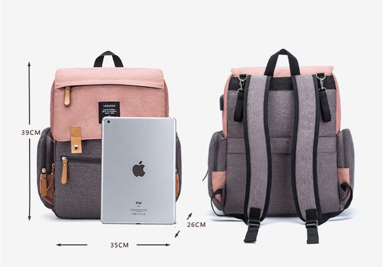 Two backpacks, one pink and gray, and one gray, with an Apple iPad for scale on a white background.